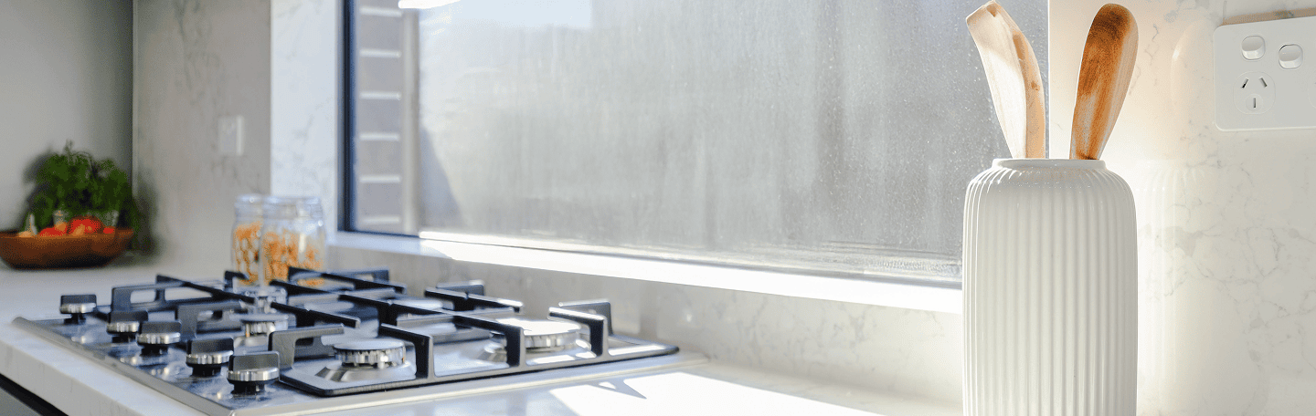 Modern kitchen with gas stove and clean countertop